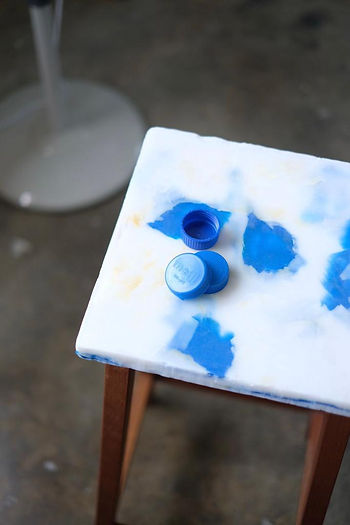A refurbished stool, made by replacing its broken top with one made from locally recycled plastic waste! 